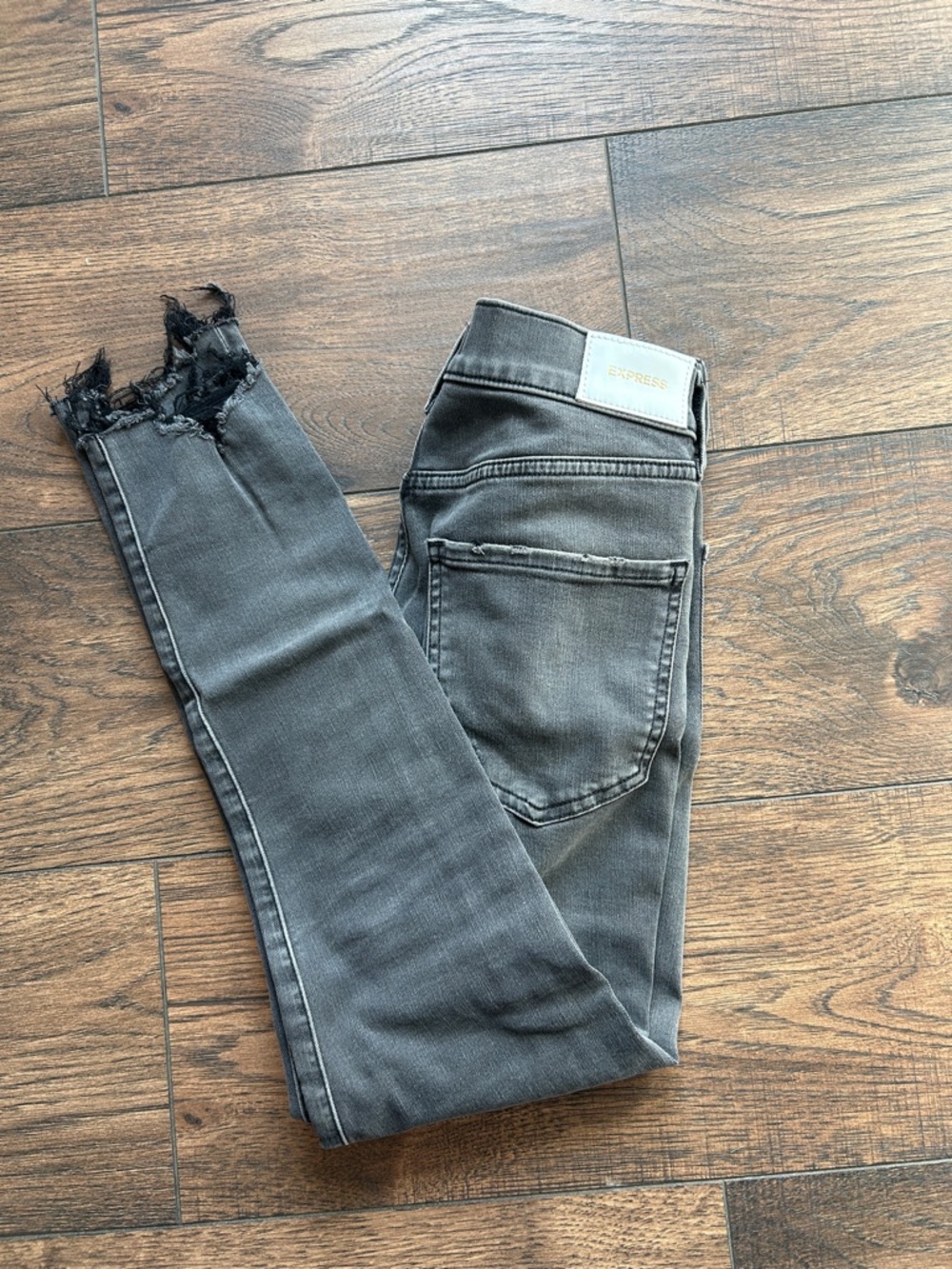 Express Women's Charcoal Grey Skinny Jeans with Frayed Ankles